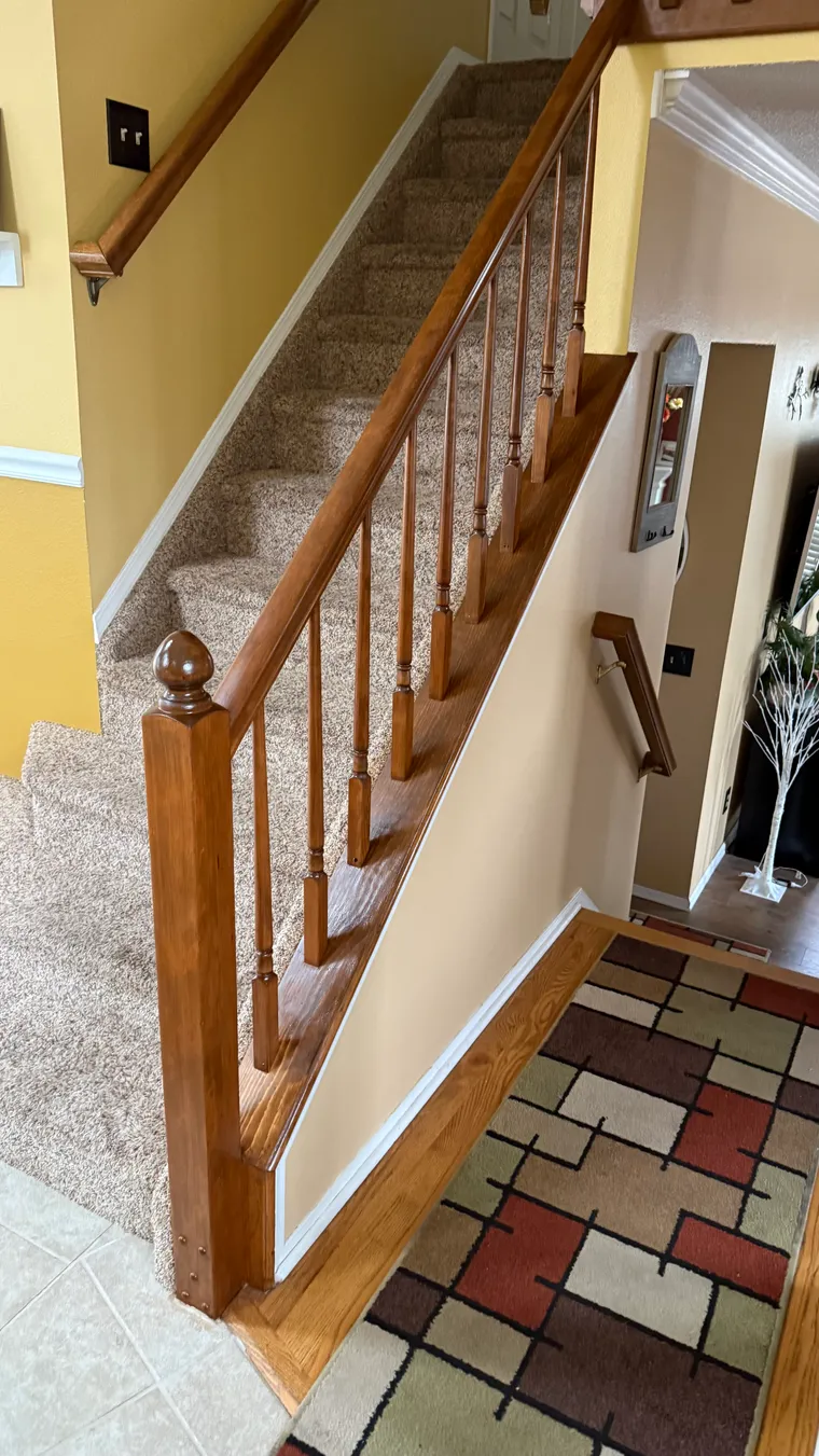 Refinished staircase and railing after