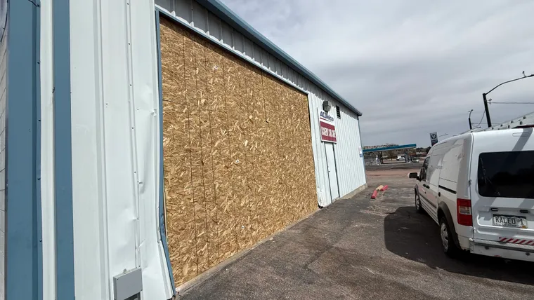 Repaired and secured storefront after