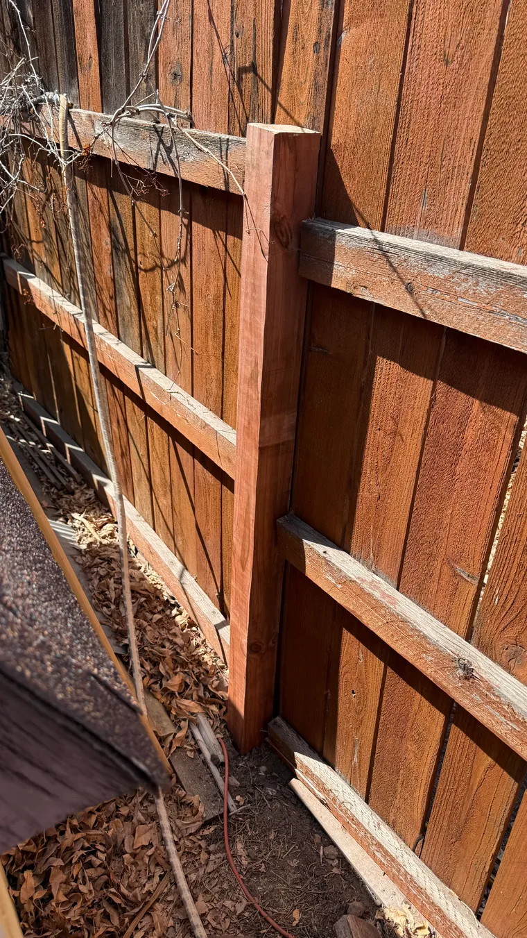 Repaired fence after